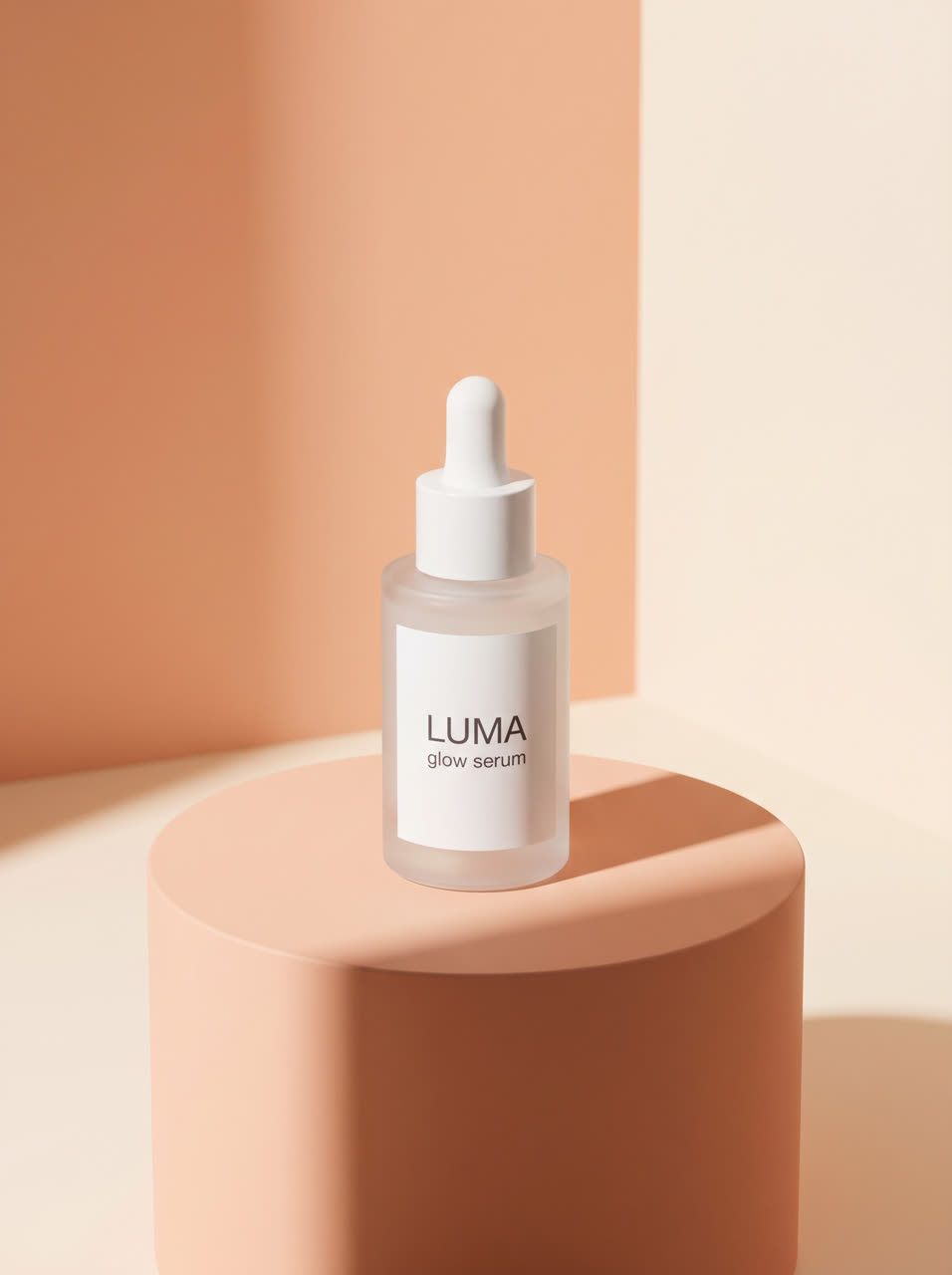 LUMA serum on a peach pedestal